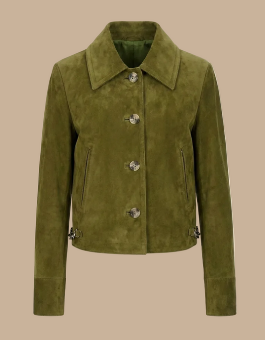 Green suede jacket with button details on a beige background