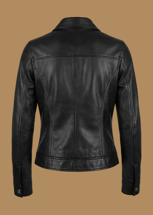 Women's black sheepskin leather jacket with a pointed collar and silver hardware by Kingsmen Couture.