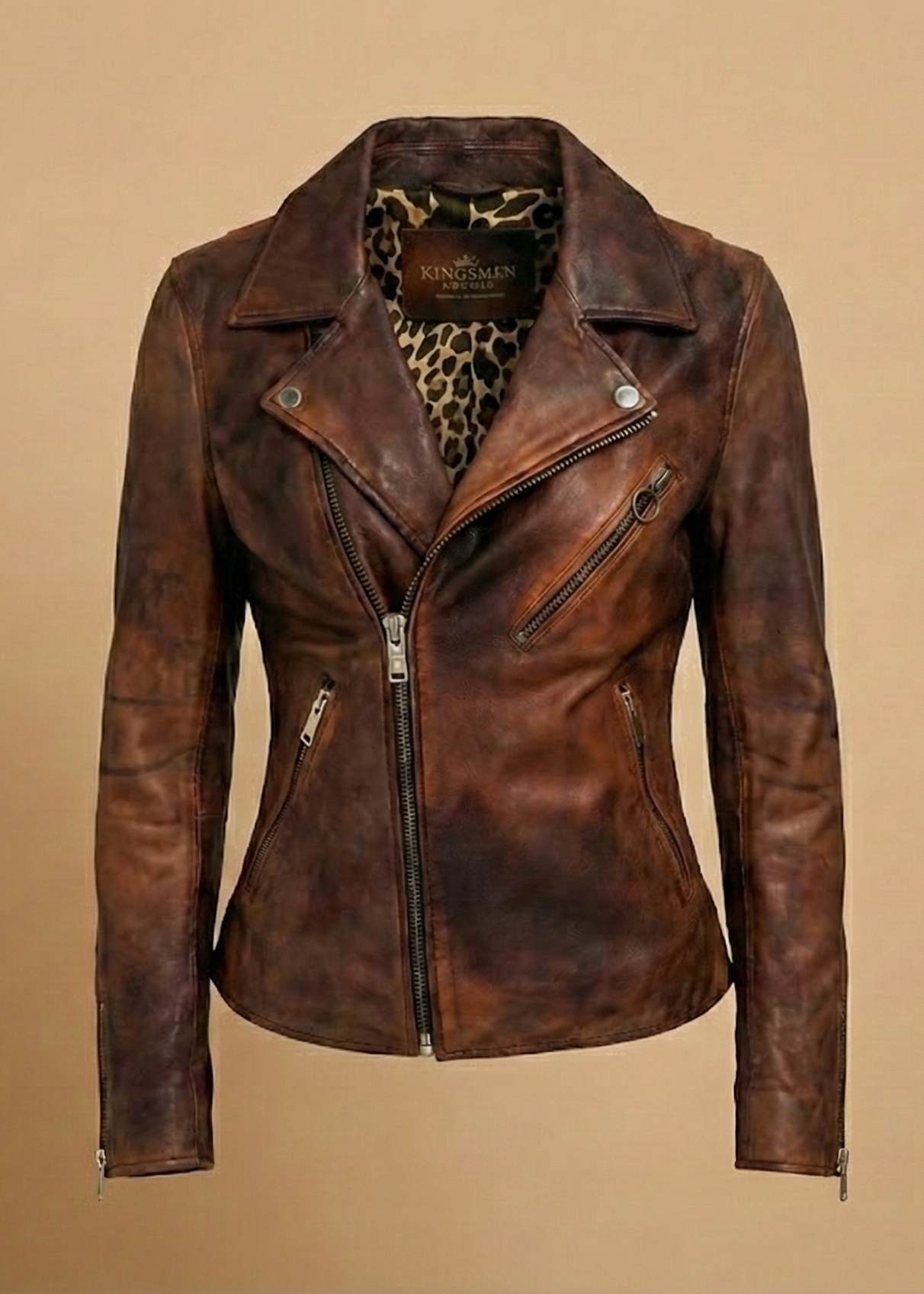 Women's distressed brown sheepskin leather biker jacket with silver hardware and animal print lining by Kingsmen Couture.