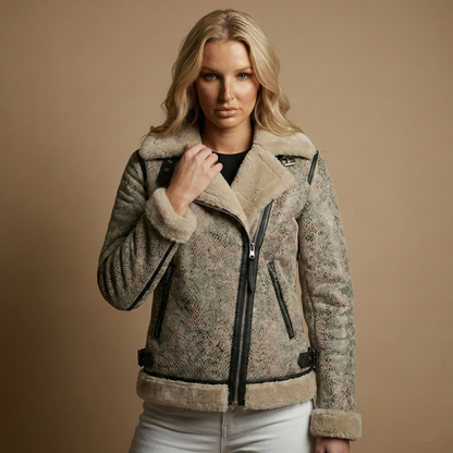 Woman wearing a patterned jacket with fur trim on a beige background
