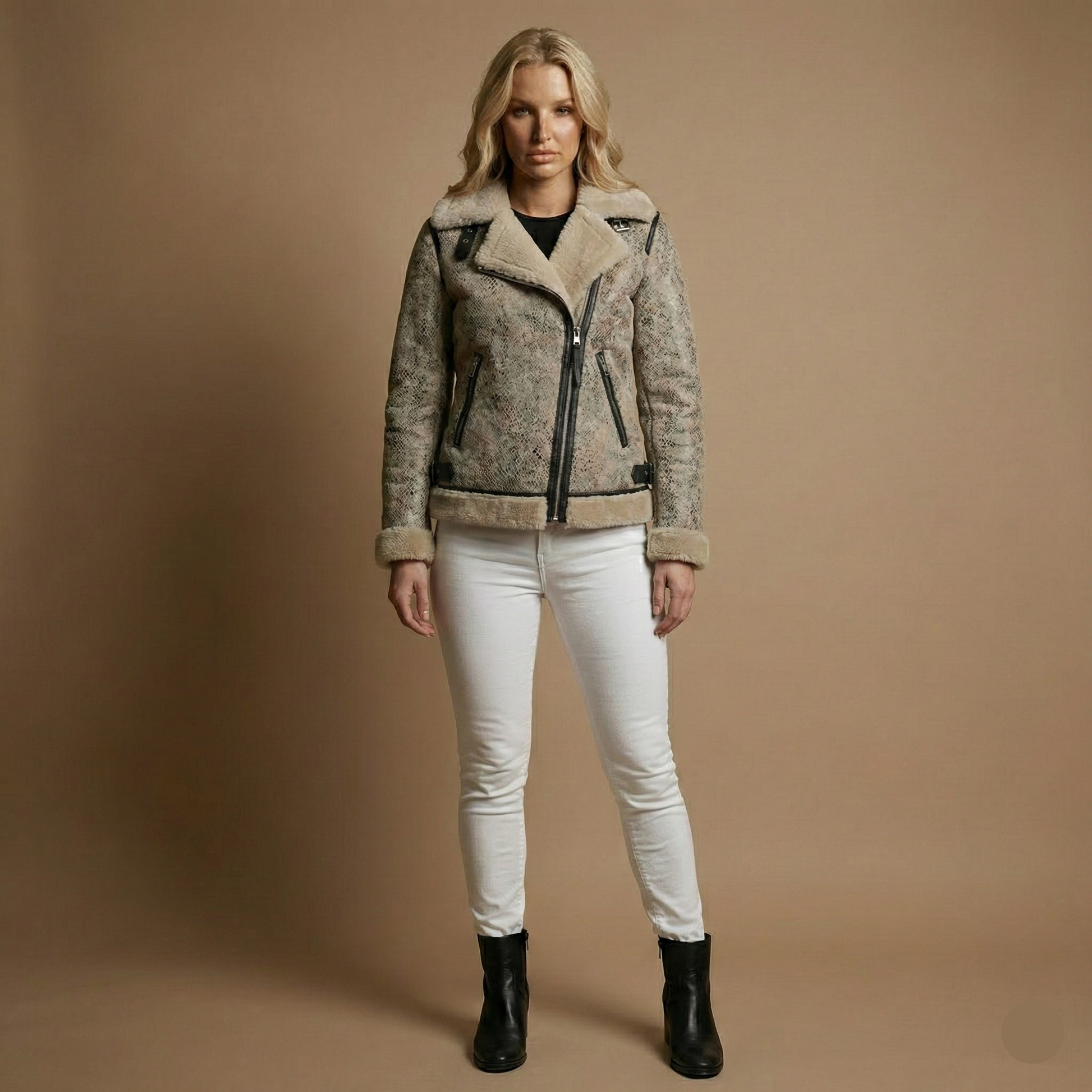 Women's cream crackled shearling biker jacket with black leather trim and silver hardware by Kingsmen Couture.