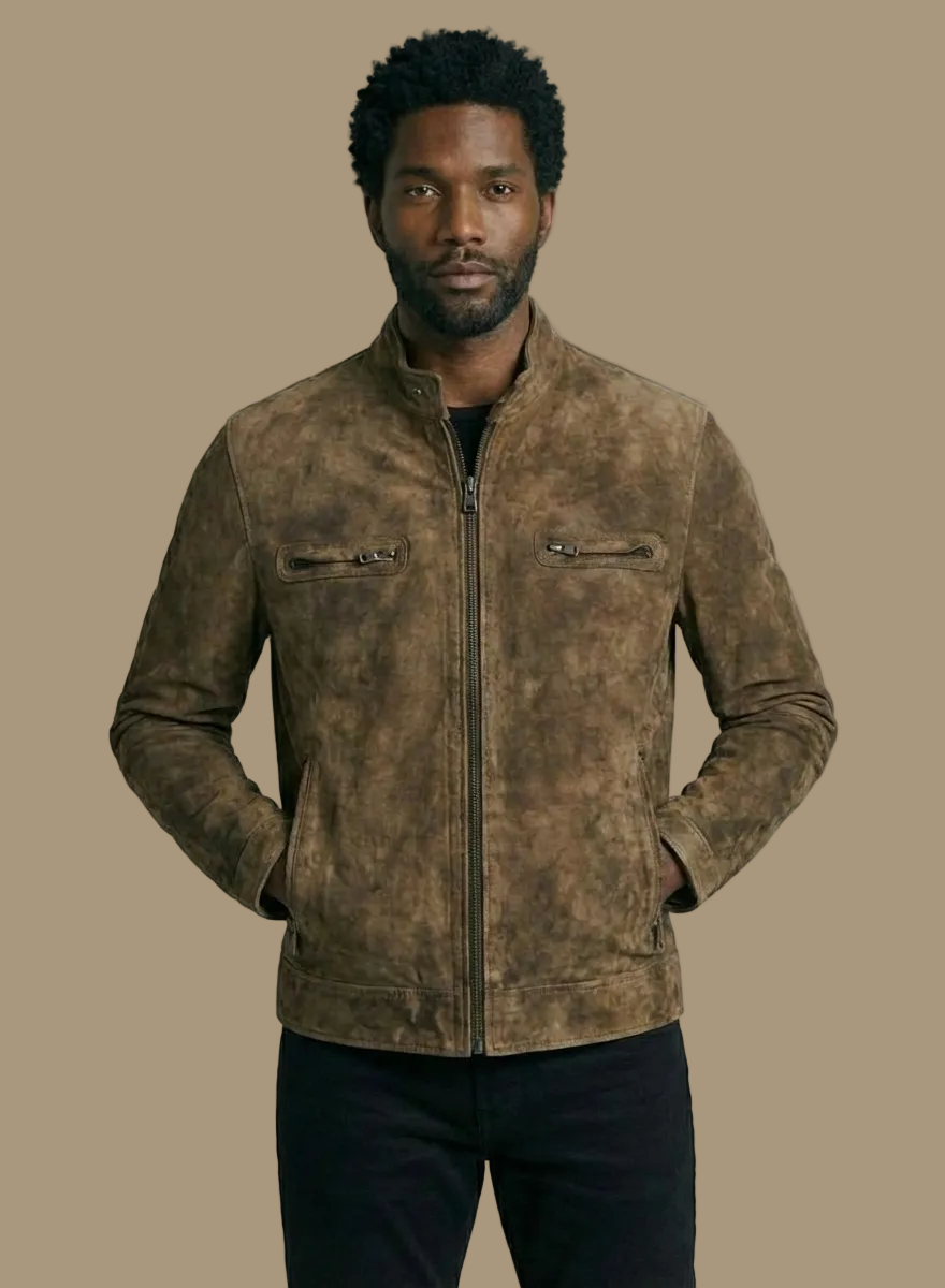 Man wearing a brown suede jacket against a plain background