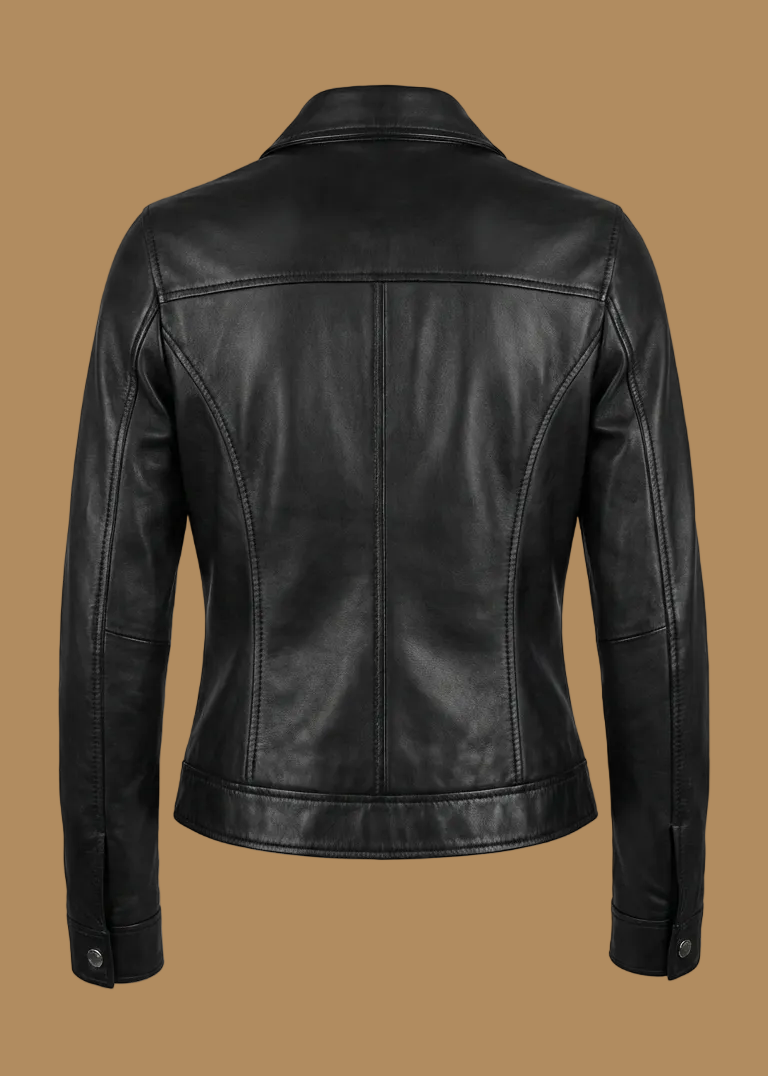 Women's black sheepskin leather jacket with a pointed collar and silver hardware by Kingsmen Couture.