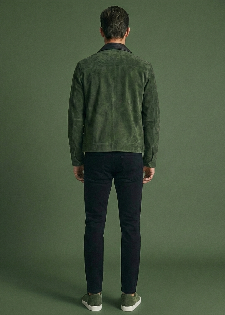 Men's green suede field jacket featuring a black checkered leather collar and chest pocket by Kingsmen Couture.
