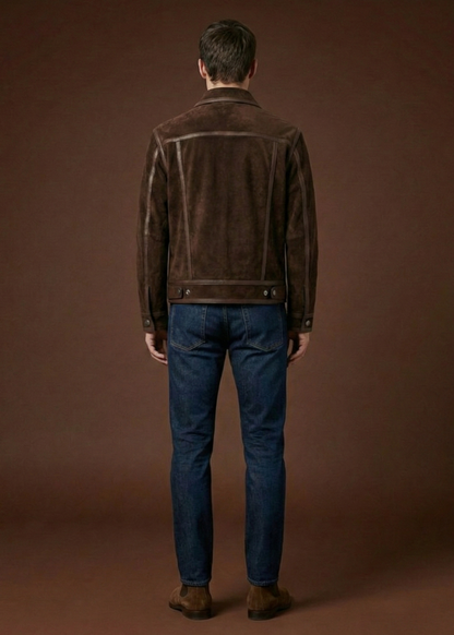 Men's dark brown sheepskin suede jacket featuring polished leather borders, silver hardware, and a pointed collar by Kingsmen Couture.