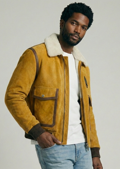 Tan suede aviator jacket with white shearling collar and ribbed cuffs by Kingsmen Couture.
