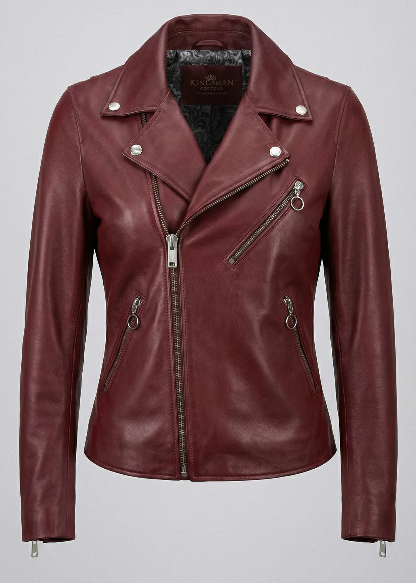 Women's burgundy sheepskin leather asymmetrical biker jacket with silver O-ring zippers by Kingsmen Couture.