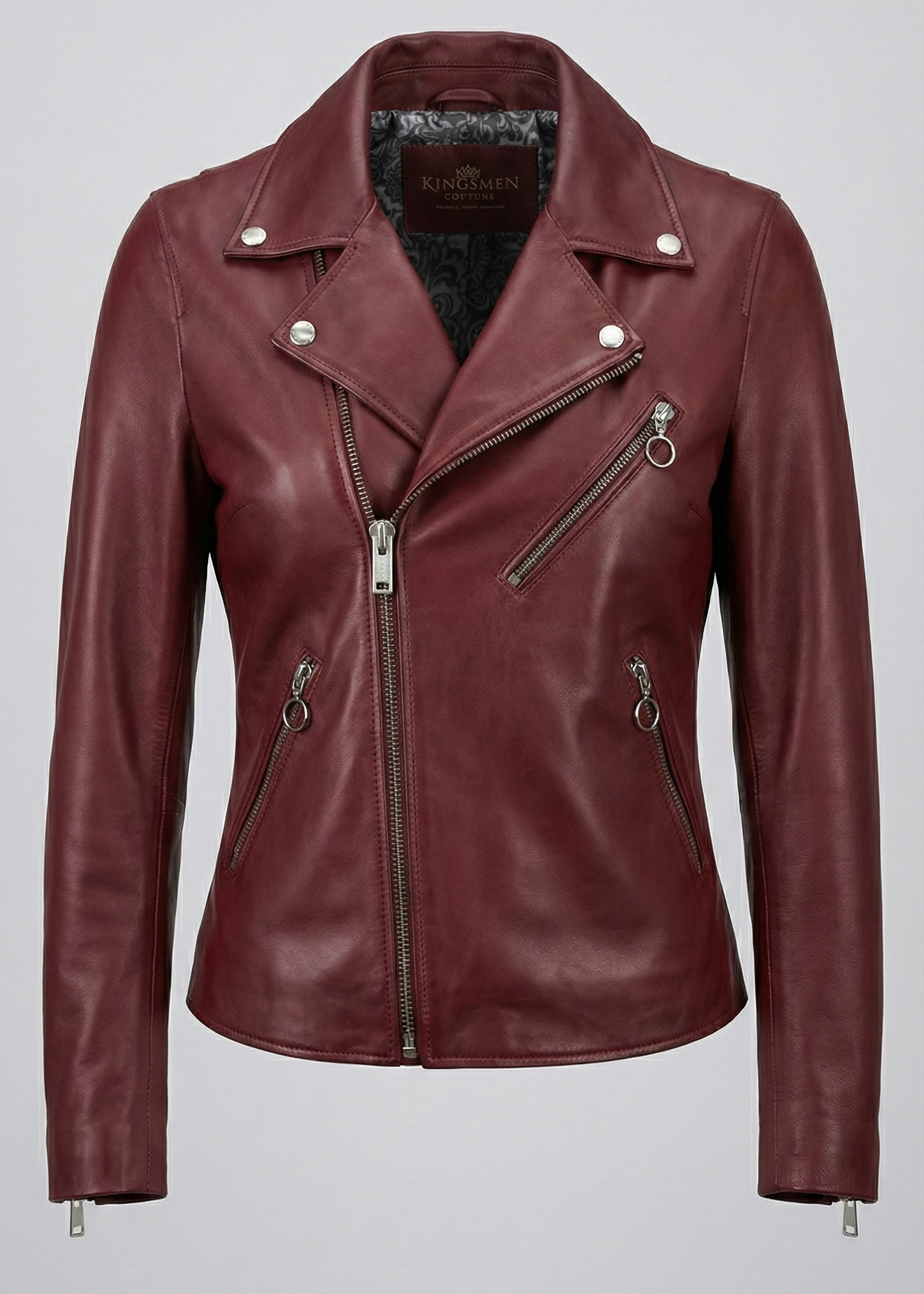 Women's burgundy sheepskin leather asymmetrical biker jacket with silver O-ring zippers by Kingsmen Couture.