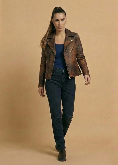 Women's distressed brown sheepskin leather biker jacket with silver hardware and animal print lining by Kingsmen Couture.